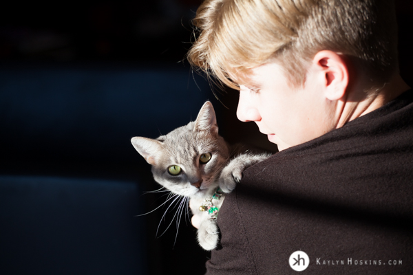 CA Senior adores his cat during high school senior portrait session Kaylyn Hoskins Photography 