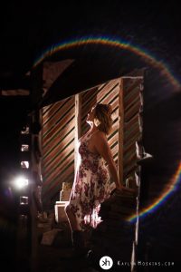 Gorgeous Wife standing in old barn during boudoir shoot in solon, iowa