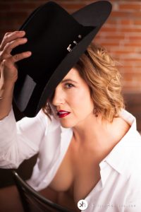 Gorgeous Woman wearing husband's white button down shirt and his Cowboy hat