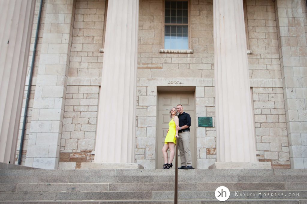Love birds standing on steps of Old Capital in Iowa City