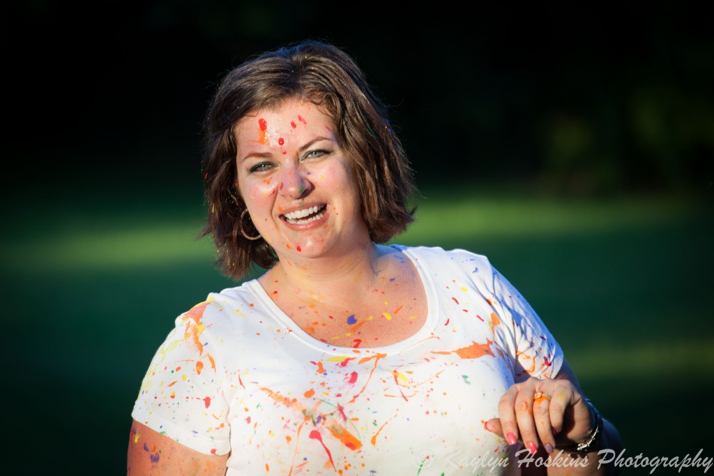 Happy Mom after fun paint fight during family pictures with Kaylyn Hoskins Photography