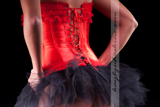 Lacie Joy rocking her tu-tu and red corset during her boudoir session with Kaylyn Hoskins Photography