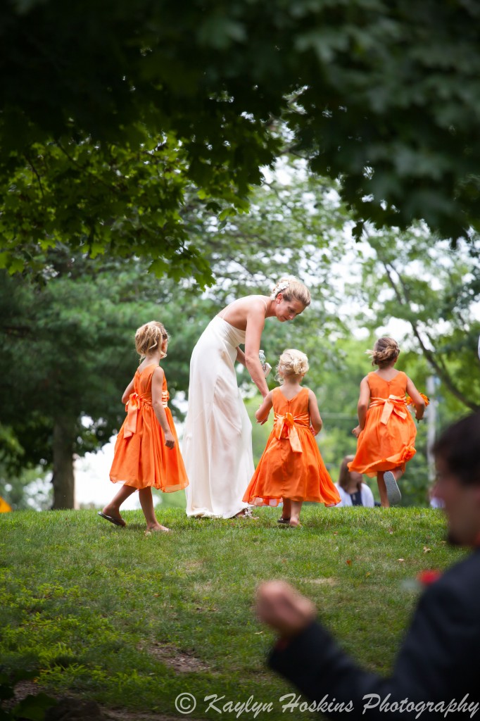 The gorgeous bride gets the girls ready to walk down the isle at the Little Brown Church