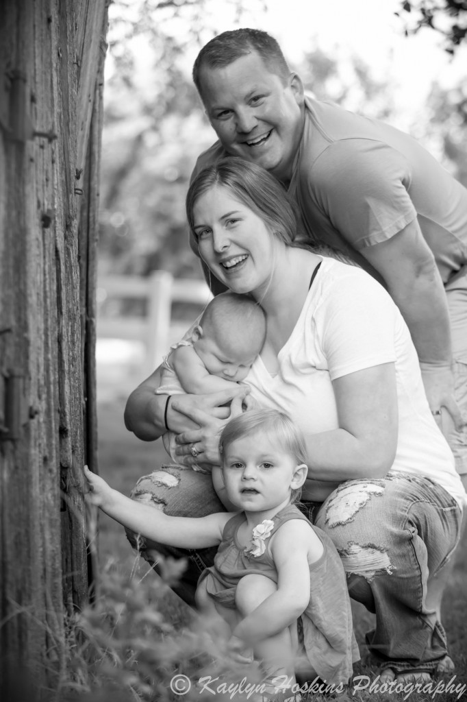 Family near old out building family photos