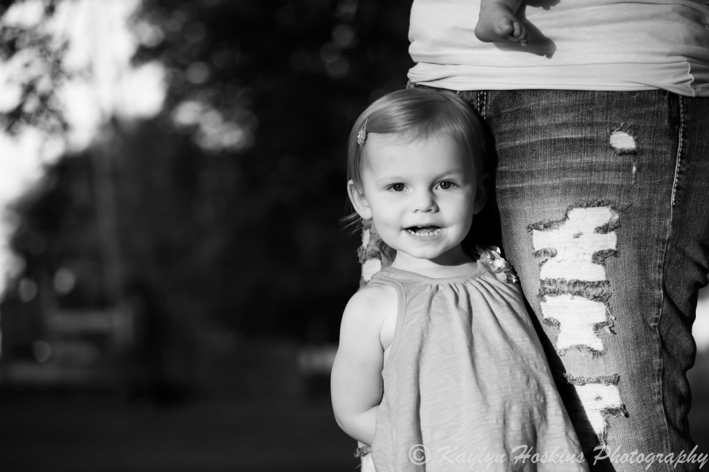 daughter smiles during family photos