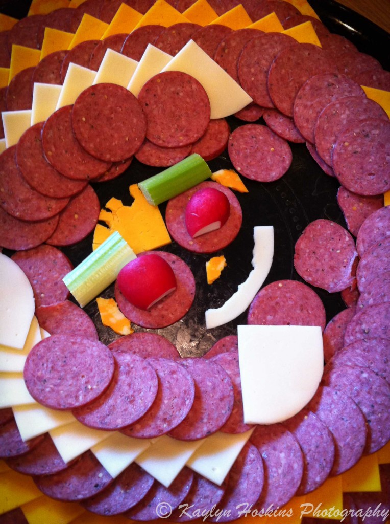 fun face made in meat & cheese tray