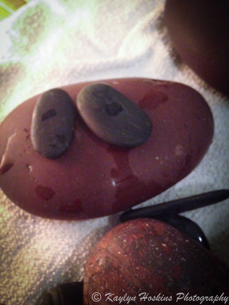 Fun face found on hot stone massage rocks
